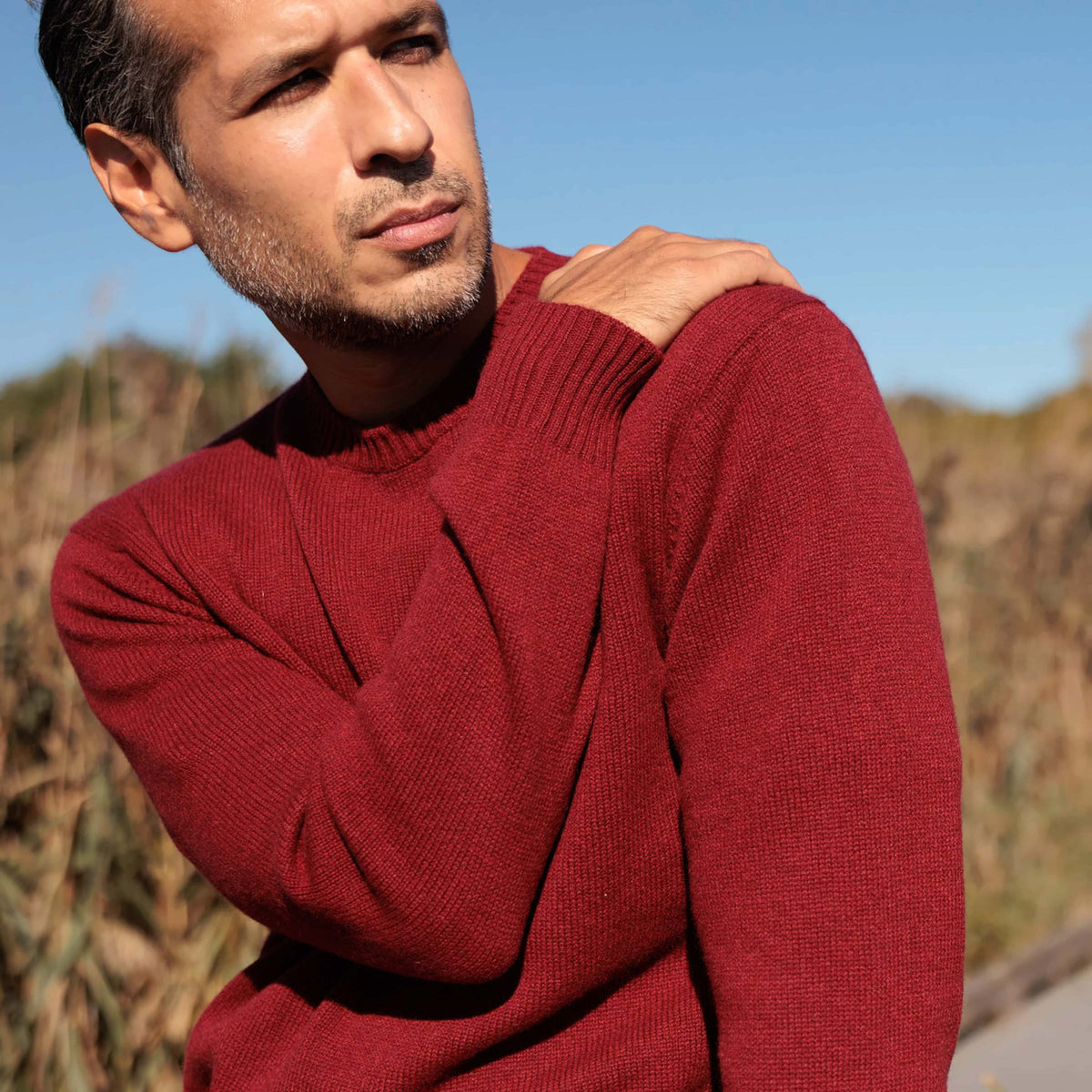 The Fraser 4-ply Scottish cashmere relaxed crewneck in Russet Red, shoulder and knit texture detail