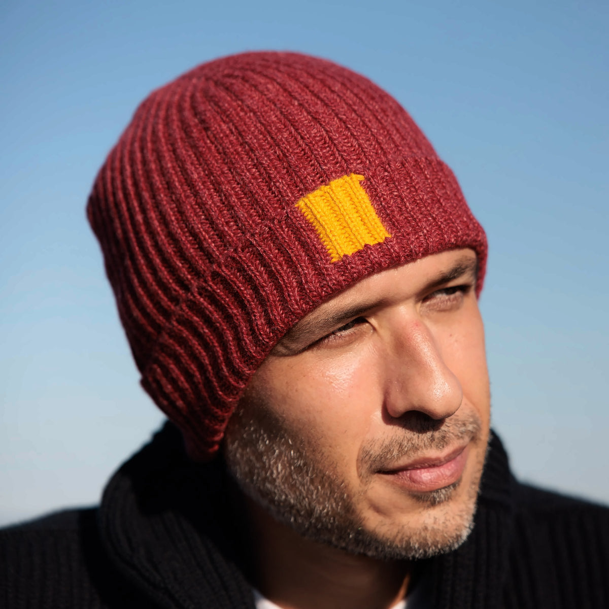 The George 8-ply Scottish cashmere beanie in Rowan, three-quarter view showing the cuff