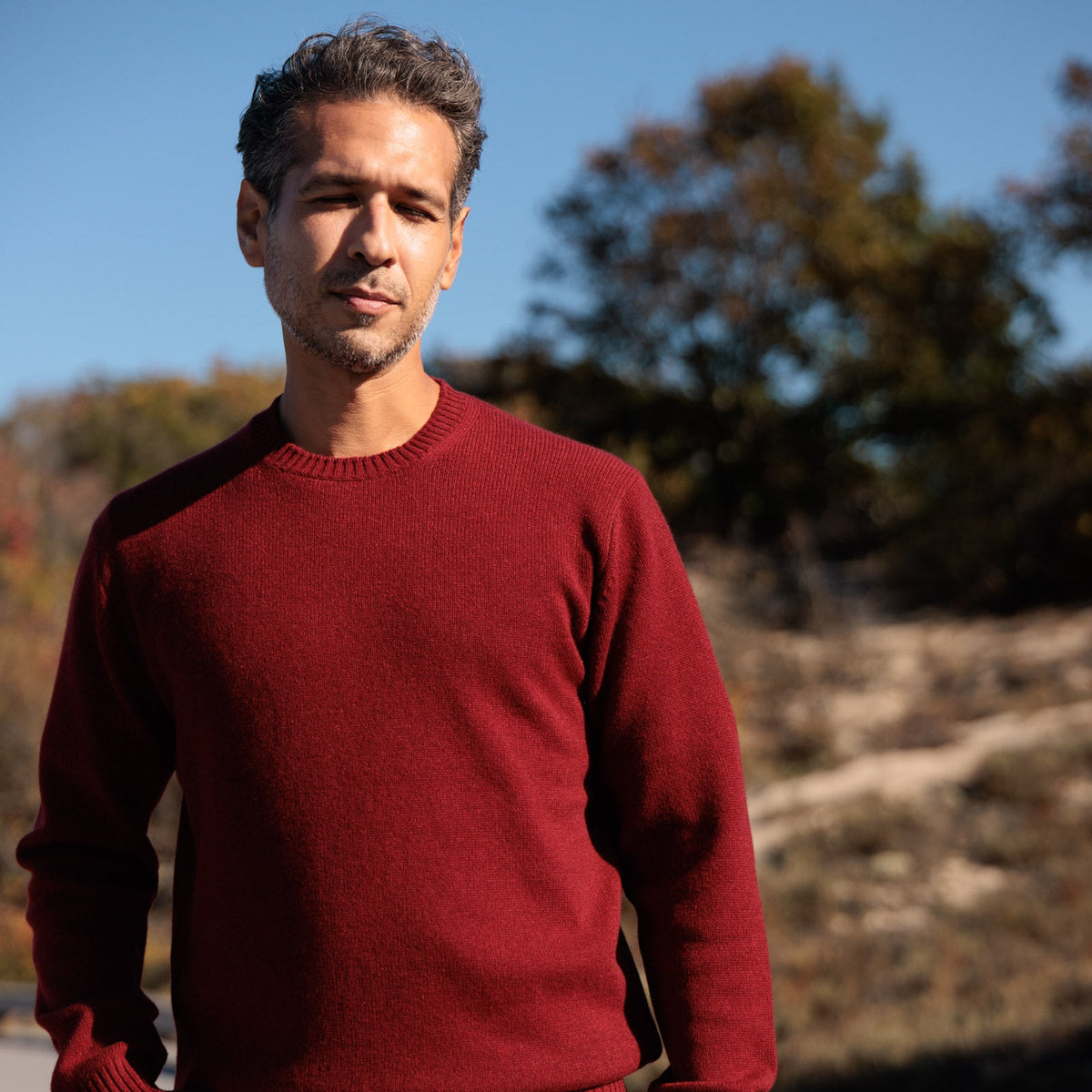 The Fraser 4-ply Scottish cashmere relaxed crewneck in Russet Red, showing the relaxed fit