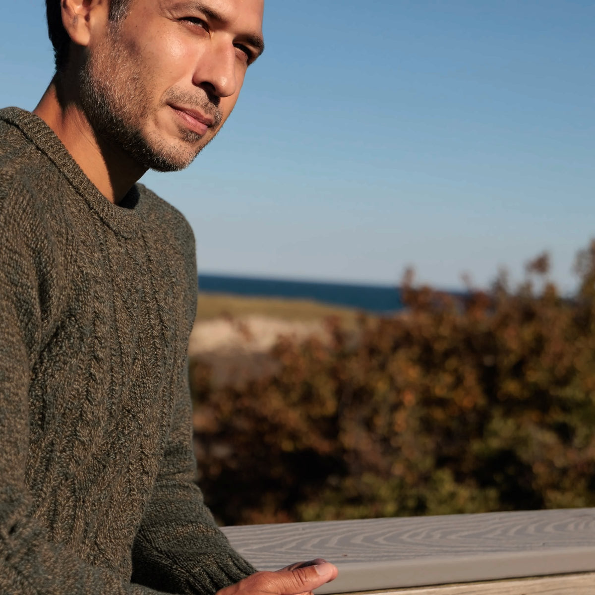 The Ross 4-ply Scottish lambswool cable knit crewneck in Bracken, cable detail on the sleeve and shoulder